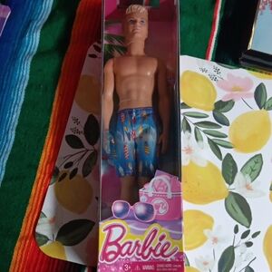 Barbie Ken Doll with Vibrant Blue Surfboard Shorts